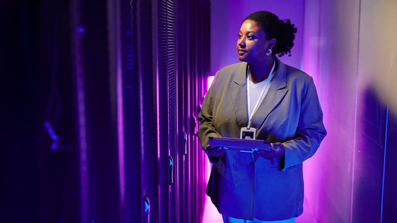 Female It Engineer Working In Data Center (1)