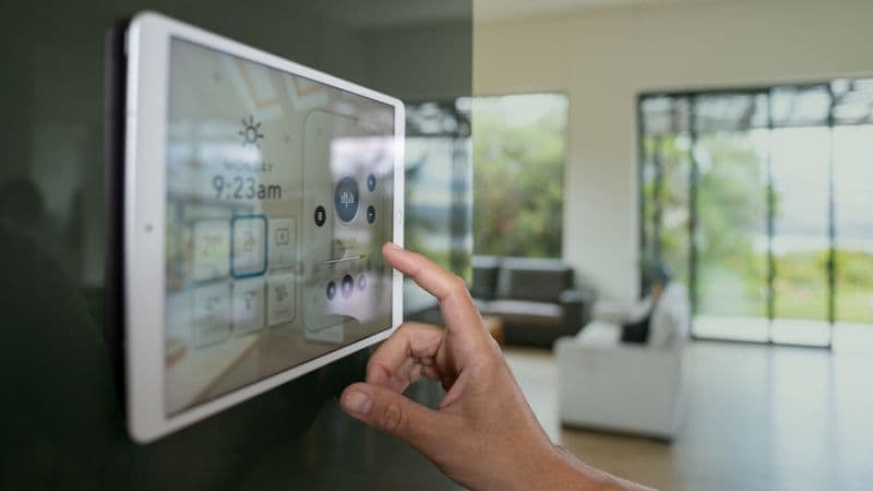 Close Up On A Person Using A Home Automation System